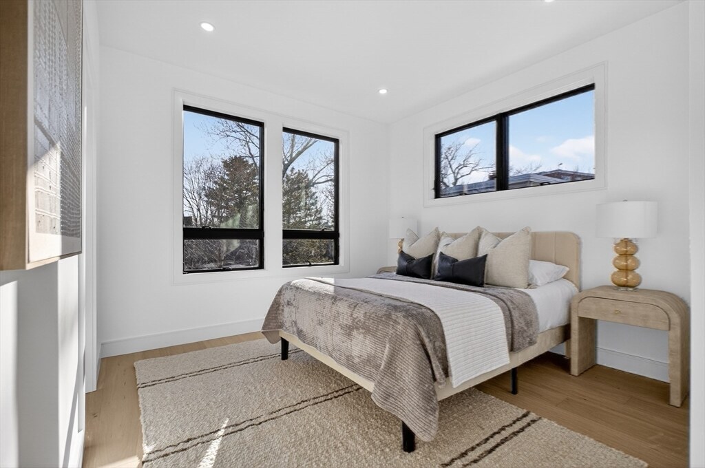Sunlit bedroom with designer furnishings