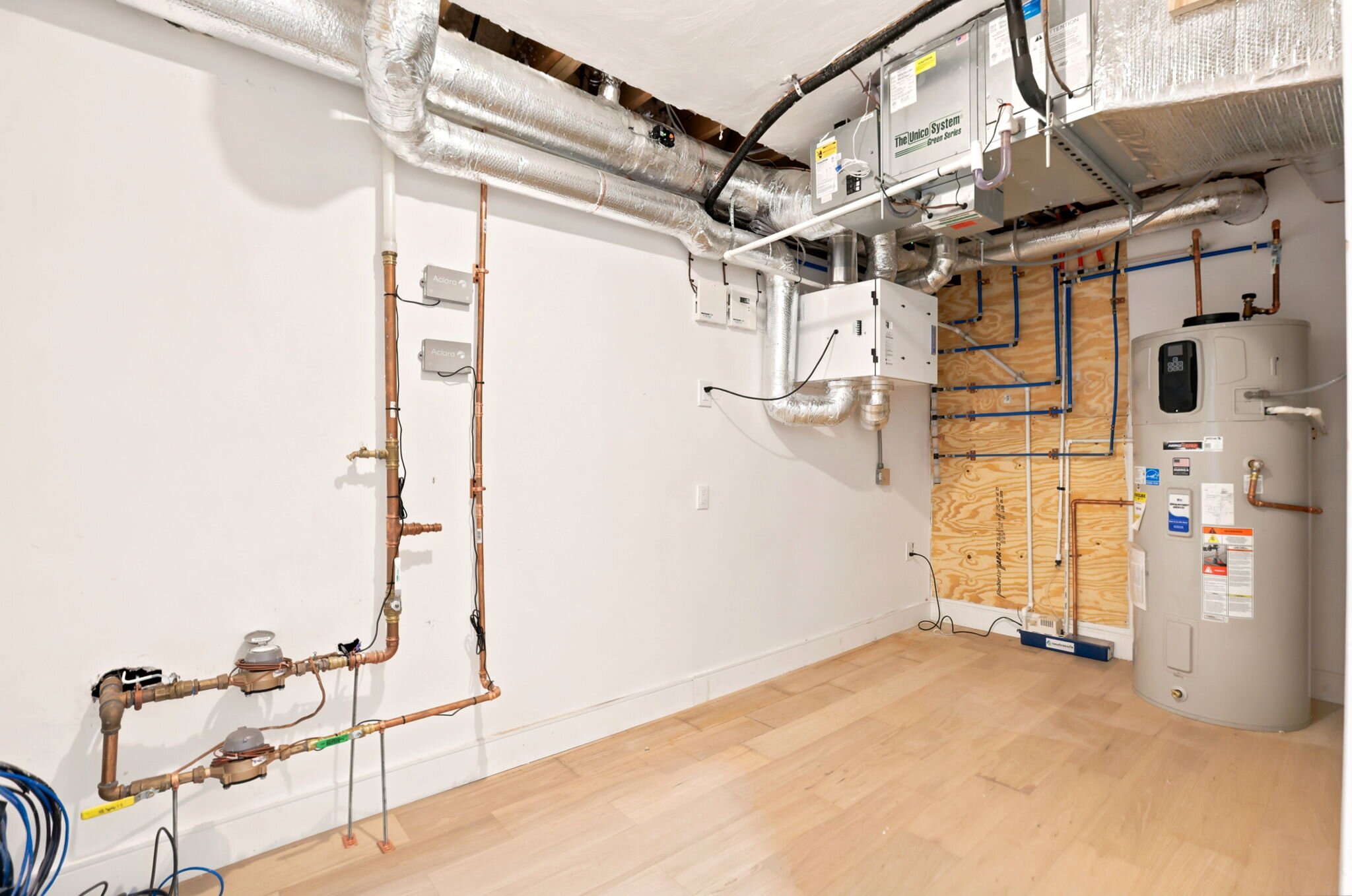 Mechanical room — fully fossil-fuel-free systems with 400-amp service
